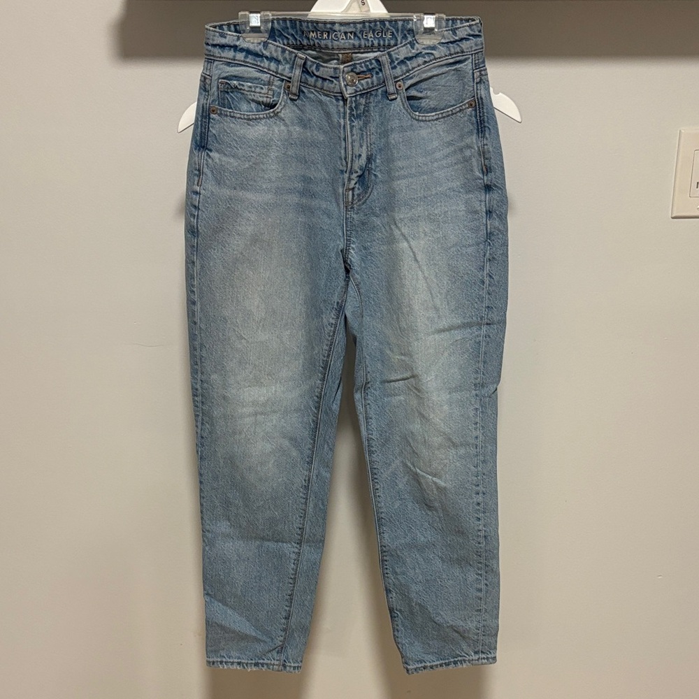 American Eagle Outfitters light wash mom jeans.